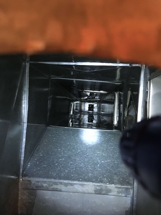 Clean residential sheet-metal air duct after professional duct cleaning